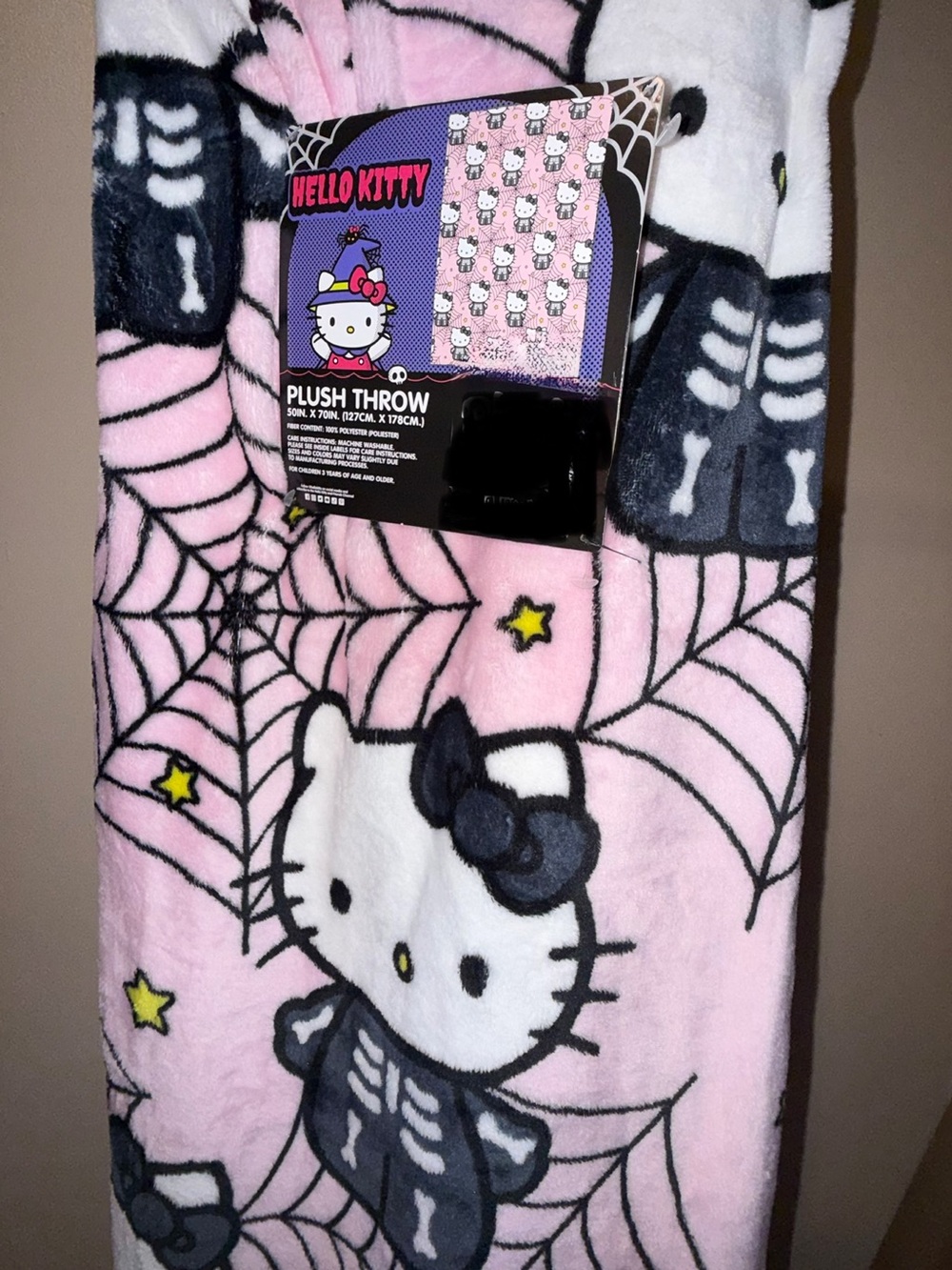 Hello Kitty Pink Plush Halloween Throw with Black Skeleton Motif